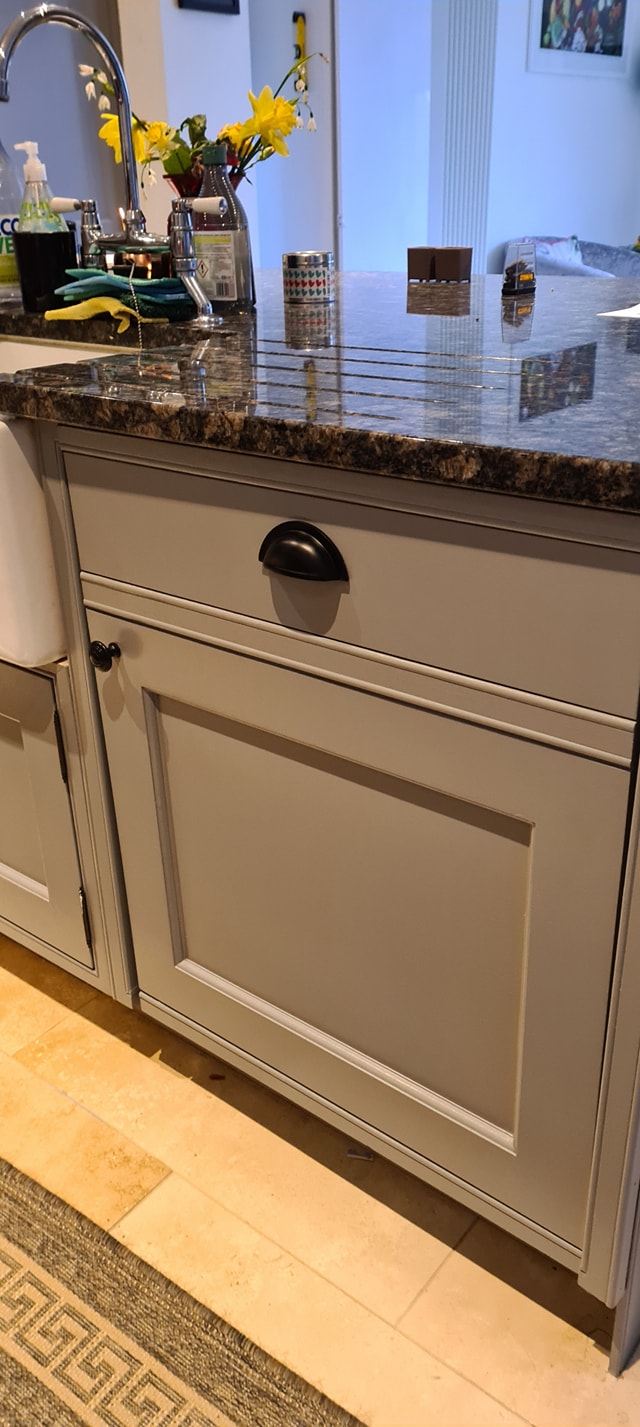 Grey painted kitchen drawers